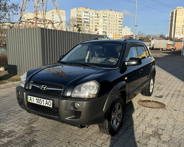 Черный Хендай Туксон, объемом двигателя 1.98 л и пробегом 220 тыс. км за 7500 $, фото 17 на Automoto.ua