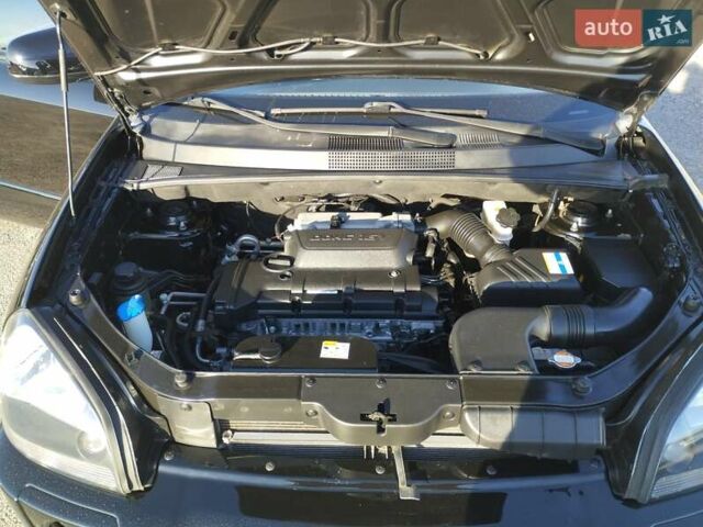 Черный Хендай Туксон, объемом двигателя 1.99 л и пробегом 159 тыс. км за 9700 $, фото 10 на Automoto.ua