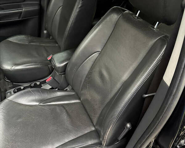 Черный Хендай Туксон, объемом двигателя 2.66 л и пробегом 205 тыс. км за 10000 $, фото 40 на Automoto.ua