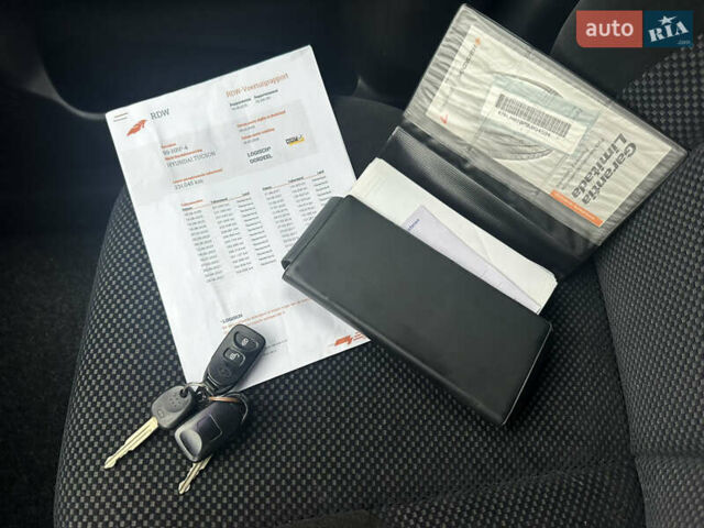 Чорний Хендай Туксон, об'ємом двигуна 1.98 л та пробігом 230 тис. км за 8700 $, фото 20 на Automoto.ua