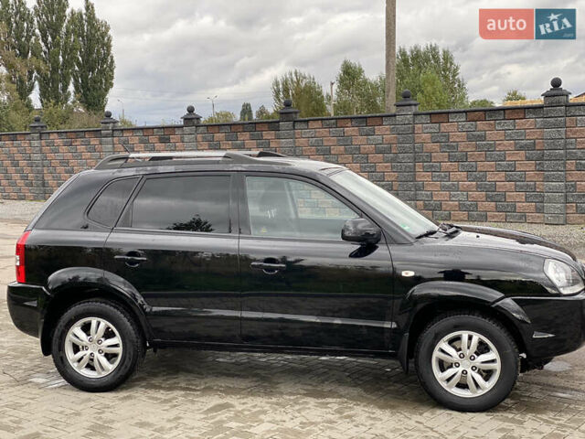 Черный Хендай Туксон, объемом двигателя 2 л и пробегом 191 тыс. км за 7800 $, фото 12 на Automoto.ua