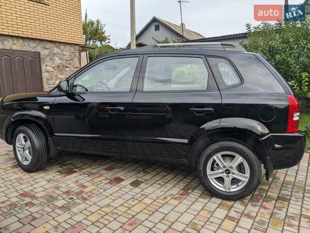 Чорний Хендай Туксон, об'ємом двигуна 2 л та пробігом 217 тис. км за 7700 $, фото 9 на Automoto.ua