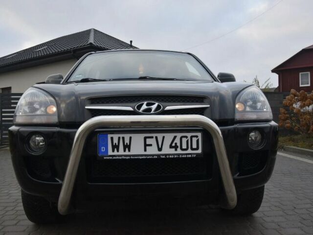 Черный Хендай Туксон, объемом двигателя 2 л и пробегом 184 тыс. км за 5480 $, фото 12 на Automoto.ua