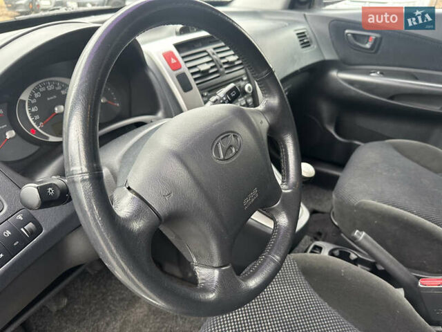 Чорний Хендай Туксон, об'ємом двигуна 1.98 л та пробігом 230 тис. км за 8700 $, фото 15 на Automoto.ua