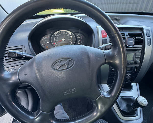 Чорний Хендай Туксон, об'ємом двигуна 1.98 л та пробігом 200 тис. км за 8200 $, фото 6 на Automoto.ua