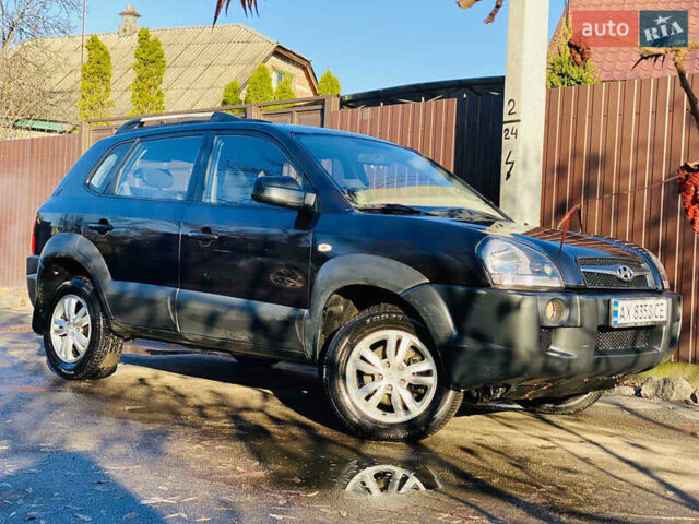 Черный Хендай Туксон, объемом двигателя 1.99 л и пробегом 95 тыс. км за 8700 $, фото 33 на Automoto.ua