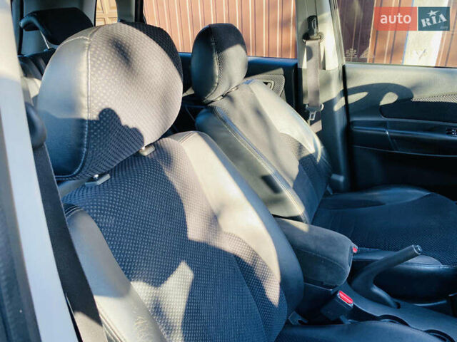 Черный Хендай Туксон, объемом двигателя 1.99 л и пробегом 95 тыс. км за 8500 $, фото 11 на Automoto.ua