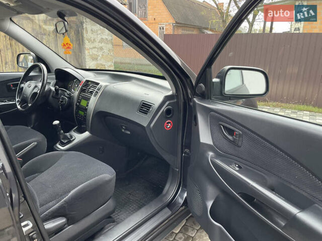 Чорний Хендай Туксон, об'ємом двигуна 2 л та пробігом 200 тис. км за 8450 $, фото 27 на Automoto.ua