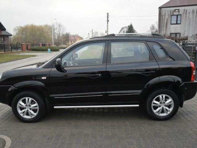 Черный Хендай Туксон, объемом двигателя 2 л и пробегом 184 тыс. км за 5480 $, фото 7 на Automoto.ua