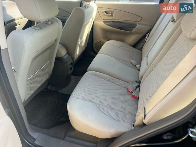 Чорний Хендай Туксон, об'ємом двигуна 2 л та пробігом 187 тис. км за 7900 $, фото 15 на Automoto.ua