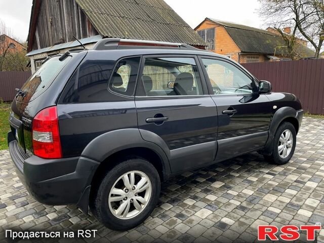 Чорний Хендай Туксон, об'ємом двигуна 2 л та пробігом 200 тис. км за 8499 $, фото 3 на Automoto.ua