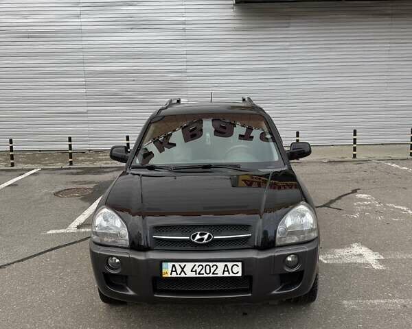 Черный Хендай Туксон, объемом двигателя 2 л и пробегом 282 тыс. км за 8700 $, фото 20 на Automoto.ua