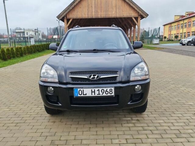 Чорний Хендай Туксон, об'ємом двигуна 1.98 л та пробігом 148 тис. км за 6199 $, фото 1 на Automoto.ua