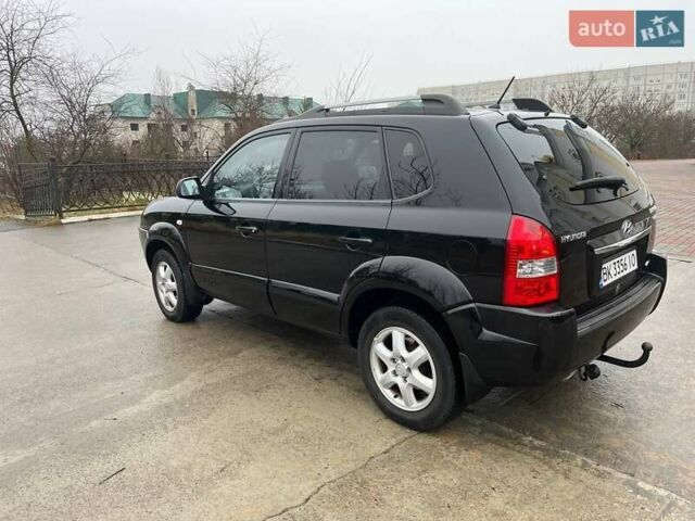 Черный Хендай Туксон, объемом двигателя 2 л и пробегом 128 тыс. км за 9200 $, фото 4 на Automoto.ua