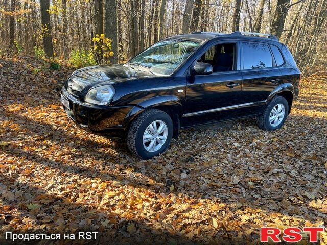 Чорний Хендай Туксон, об'ємом двигуна 2 л та пробігом 182 тис. км за 8700 $, фото 3 на Automoto.ua