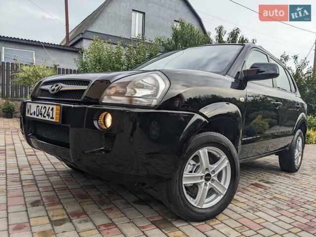 Чорний Хендай Туксон, об'ємом двигуна 2 л та пробігом 217 тис. км за 7700 $, фото 5 на Automoto.ua