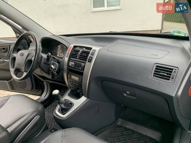 Черный Хендай Туксон, объемом двигателя 2 л и пробегом 114 тыс. км за 8850 $, фото 53 на Automoto.ua