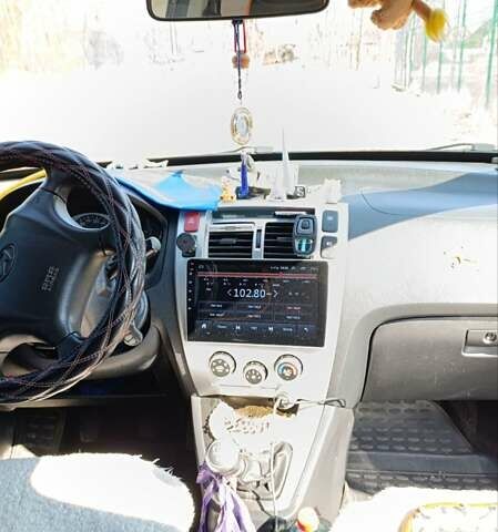 Черный Хендай Туксон, объемом двигателя 2 л и пробегом 226 тыс. км за 8700 $, фото 19 на Automoto.ua