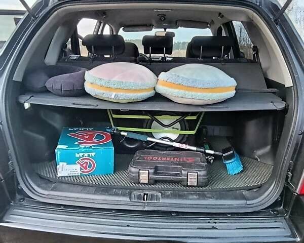 Чорний Хендай Туксон, об'ємом двигуна 1.98 л та пробігом 172 тис. км за 9500 $, фото 4 на Automoto.ua