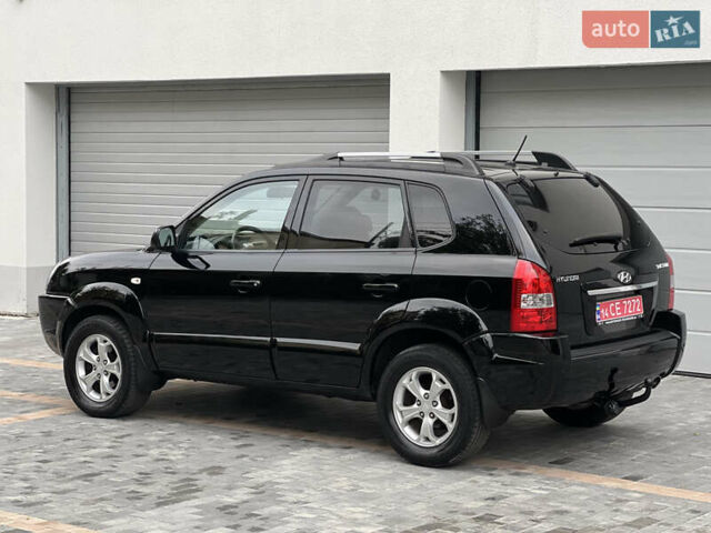 Чорний Хендай Туксон, об'ємом двигуна 2 л та пробігом 163 тис. км за 9199 $, фото 6 на Automoto.ua