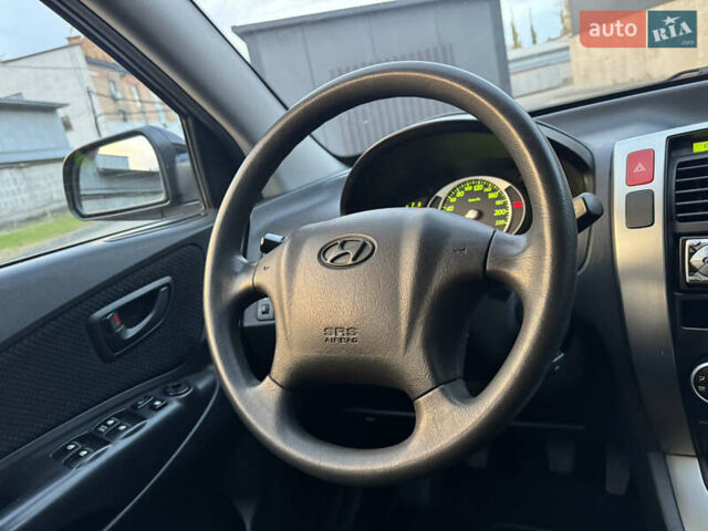 Хендай Туксон 2009 в Киеве на Automoto.ua Черный Хендай Туксон, объемом двигателя 2 л и пробегом 110 тыс. км за 8700 $, фото 32 на Automoto.ua