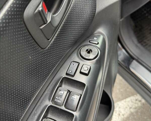 Черный Хендай Туксон, объемом двигателя 2 л и пробегом 282 тыс. км за 8700 $, фото 13 на Automoto.ua