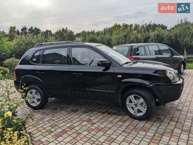 Чорний Хендай Туксон, об'ємом двигуна 2 л та пробігом 217 тис. км за 7700 $, фото 2 на Automoto.ua