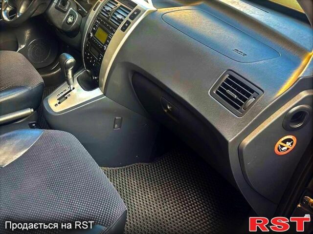 Черный Хендай Туксон, объемом двигателя 2 л и пробегом 91 тыс. км за 10999 $, фото 9 на Automoto.ua