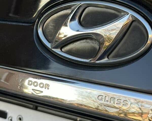 Черный Хендай Туксон, объемом двигателя 1.98 л и пробегом 198 тыс. км за 8250 $, фото 14 на Automoto.ua