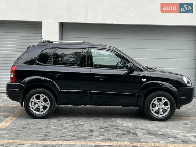 Чорний Хендай Туксон, об'ємом двигуна 2 л та пробігом 163 тис. км за 9199 $, фото 13 на Automoto.ua