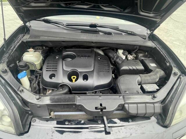 Черный Хендай Туксон, объемом двигателя 2 л и пробегом 168 тыс. км за 7500 $, фото 8 на Automoto.ua