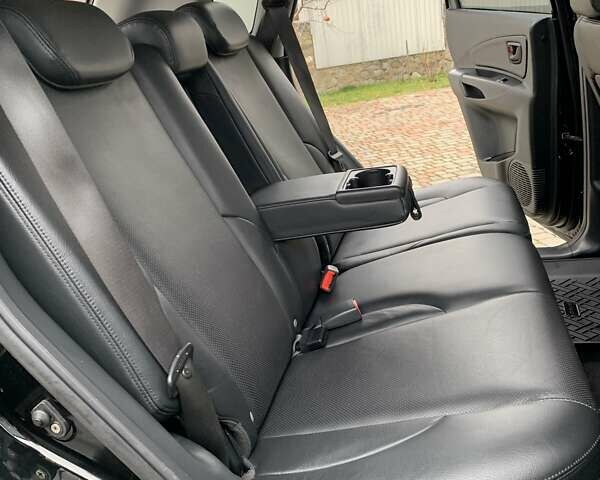 Черный Хендай Туксон, объемом двигателя 2 л и пробегом 114 тыс. км за 8850 $, фото 57 на Automoto.ua