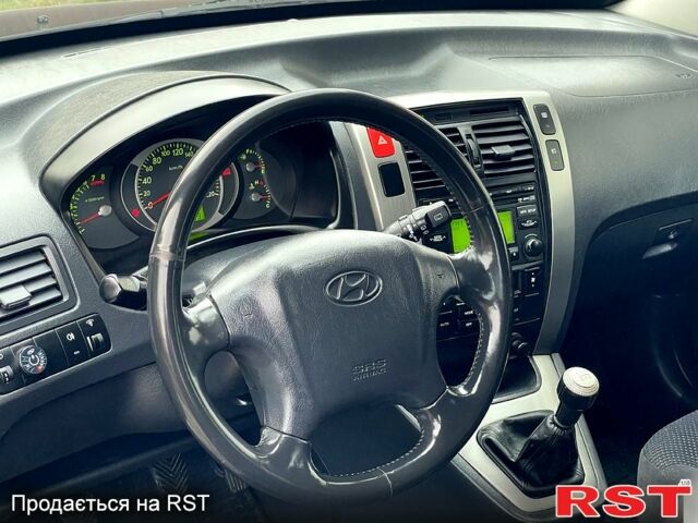 Чорний Хендай Туксон, об'ємом двигуна 2 л та пробігом 200 тис. км за 8499 $, фото 9 на Automoto.ua