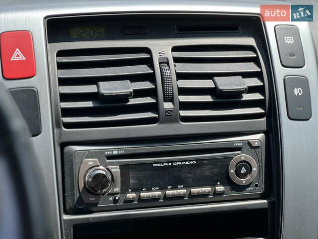 Чорний Хендай Туксон, об'ємом двигуна 2 л та пробігом 163 тис. км за 9199 $, фото 24 на Automoto.ua