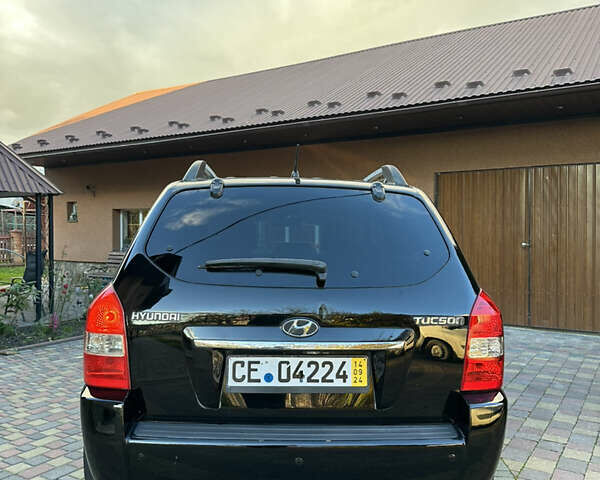 Хендай Туксон 2009 в Калуше на Automoto.ua Черный Хендай Туксон, объемом двигателя 1.98 л и пробегом 198 тыс. км за 7500 $, фото 12 на Automoto.ua