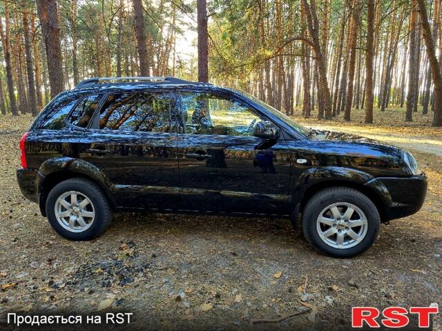 Черный Хендай Туксон, объемом двигателя 2 л и пробегом 204 тыс. км за 8900 $, фото 2 на Automoto.ua