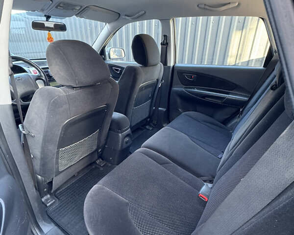 Чорний Хендай Туксон, об'ємом двигуна 1.98 л та пробігом 200 тис. км за 8200 $, фото 8 на Automoto.ua