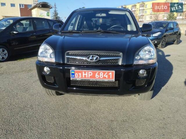 Черный Хендай Туксон, объемом двигателя 1.99 л и пробегом 159 тыс. км за 9700 $, фото 25 на Automoto.ua