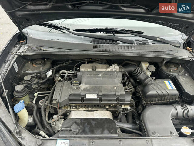 Чорний Хендай Туксон, об'ємом двигуна 1.98 л та пробігом 230 тис. км за 8700 $, фото 21 на Automoto.ua