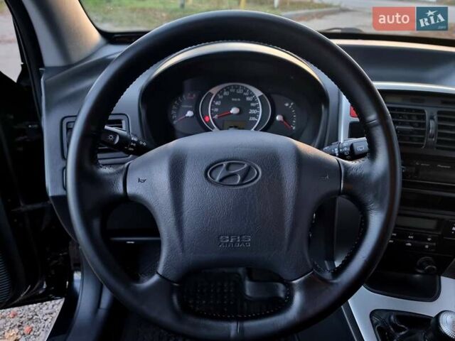 Хендай Туксон 2009 в Виннице на Automoto.ua Черный Хендай Туксон, объемом двигателя 2 л и пробегом 188 тыс. км за 9200 $, фото 34 на Automoto.ua