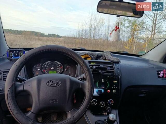 Чорний Хендай Туксон, об'ємом двигуна 1.98 л та пробігом 172 тис. км за 9500 $, фото 10 на Automoto.ua