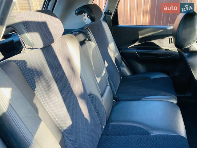 Черный Хендай Туксон, объемом двигателя 1.99 л и пробегом 95 тыс. км за 8500 $, фото 4 на Automoto.ua