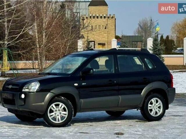 Чорний Хендай Туксон, об'ємом двигуна 2 л та пробігом 93 тис. км за 11500 $, фото 1 на Automoto.ua