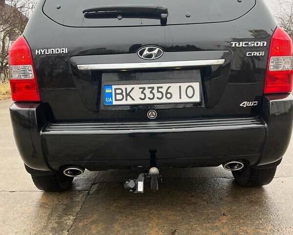 Черный Хендай Туксон, объемом двигателя 2 л и пробегом 128 тыс. км за 9200 $, фото 7 на Automoto.ua