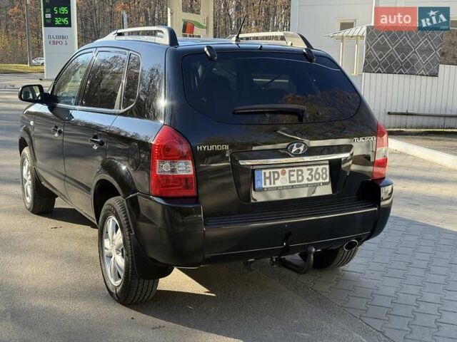Черный Хендай Туксон, объемом двигателя 2 л и пробегом 148 тыс. км за 8700 $, фото 39 на Automoto.ua