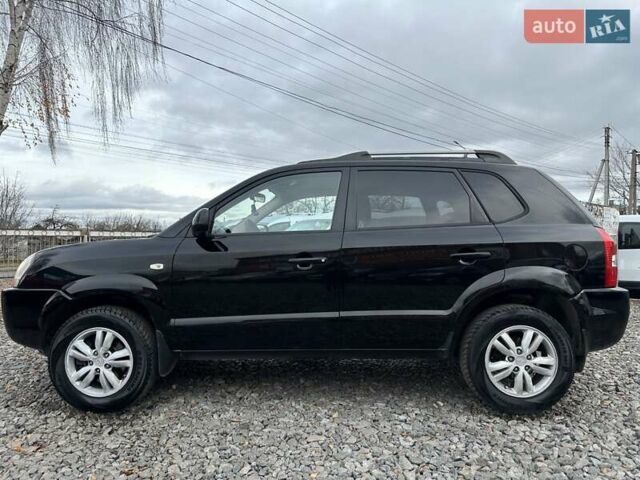 Чорний Хендай Туксон, об'ємом двигуна 2 л та пробігом 166 тис. км за 7500 $, фото 6 на Automoto.ua