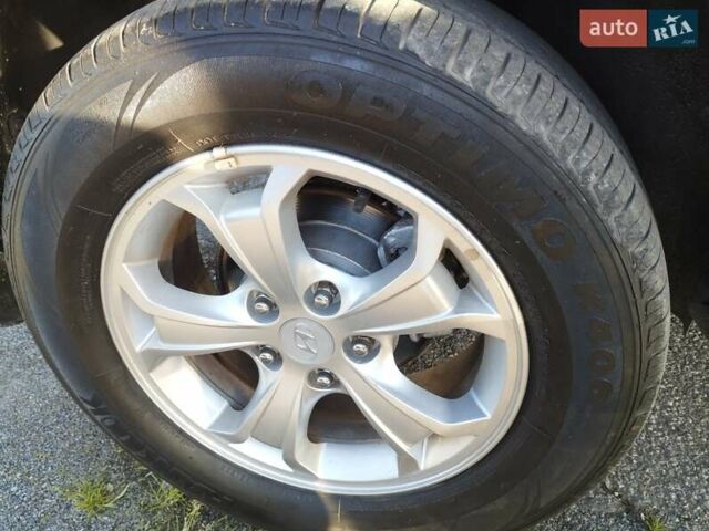 Черный Хендай Туксон, объемом двигателя 1.99 л и пробегом 159 тыс. км за 9700 $, фото 11 на Automoto.ua