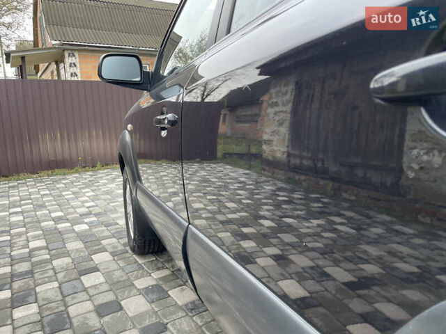 Чорний Хендай Туксон, об'ємом двигуна 2 л та пробігом 200 тис. км за 8450 $, фото 18 на Automoto.ua