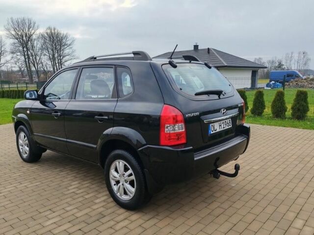 Чорний Хендай Туксон, об'ємом двигуна 1.98 л та пробігом 148 тис. км за 6199 $, фото 7 на Automoto.ua