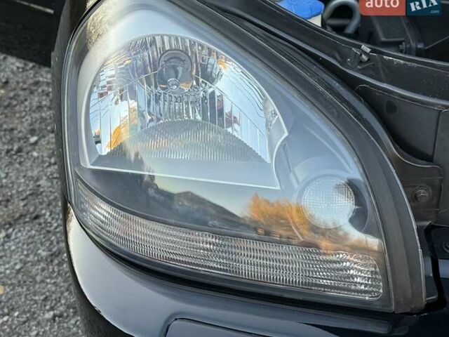 Черный Хендай Туксон, объемом двигателя 2 л и пробегом 110 тыс. км за 8899 $, фото 40 на Automoto.ua
